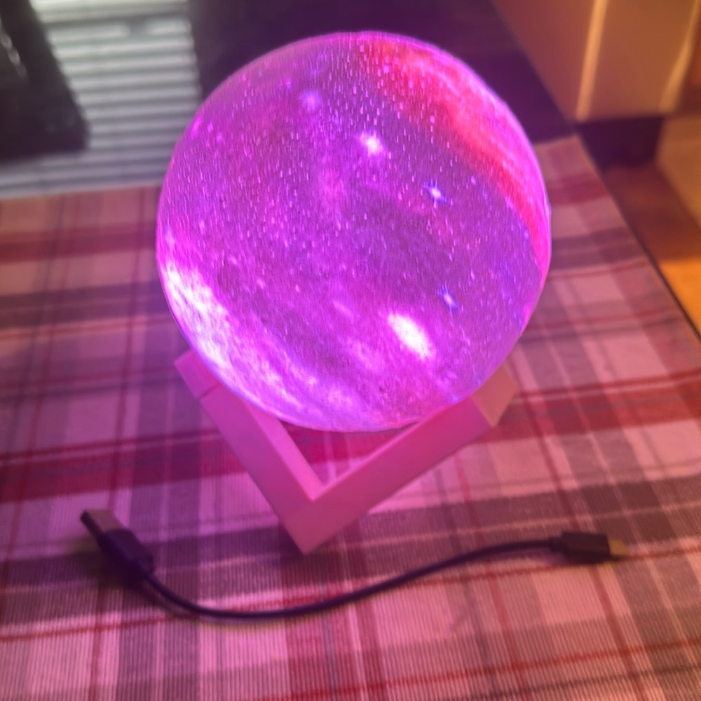 Fun little plastic moon that changes colors